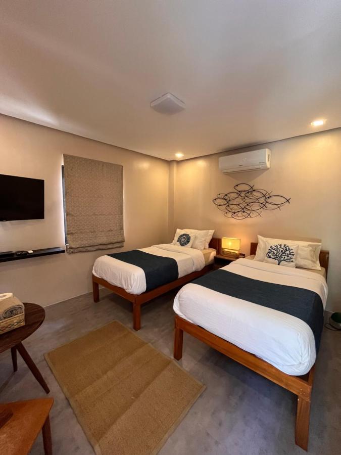 Southseas Beach Resort And Dive Center Santander Dış mekan fotoğraf