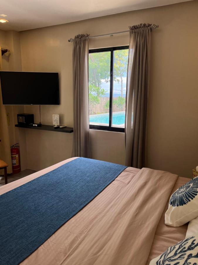 Southseas Beach Resort And Dive Center Santander Dış mekan fotoğraf