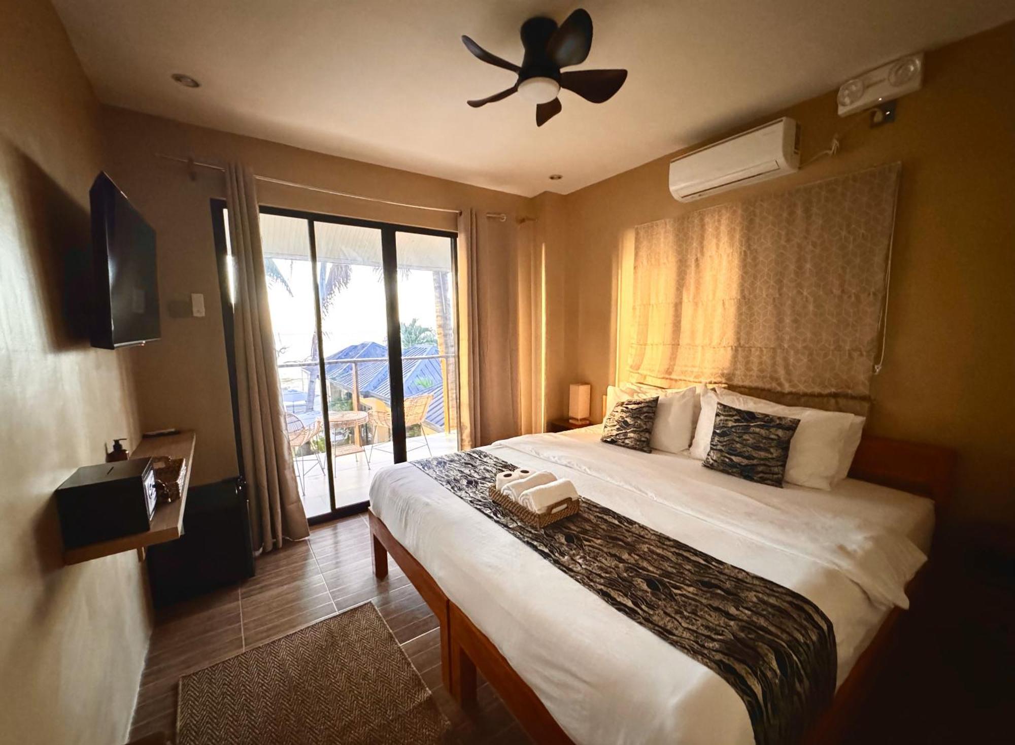 Southseas Beach Resort And Dive Center Santander Dış mekan fotoğraf